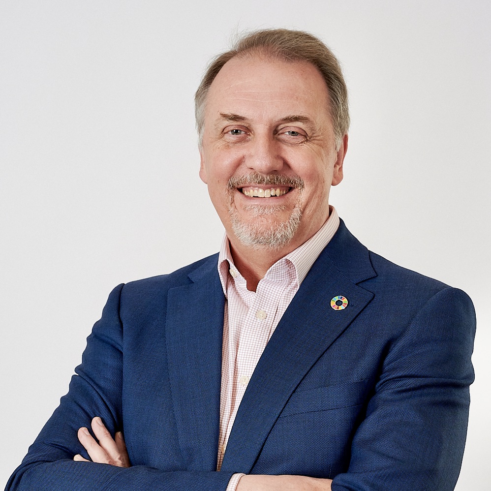 A white man smiling