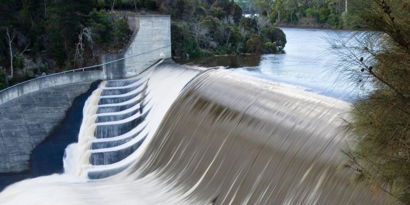Water flowing over a dam