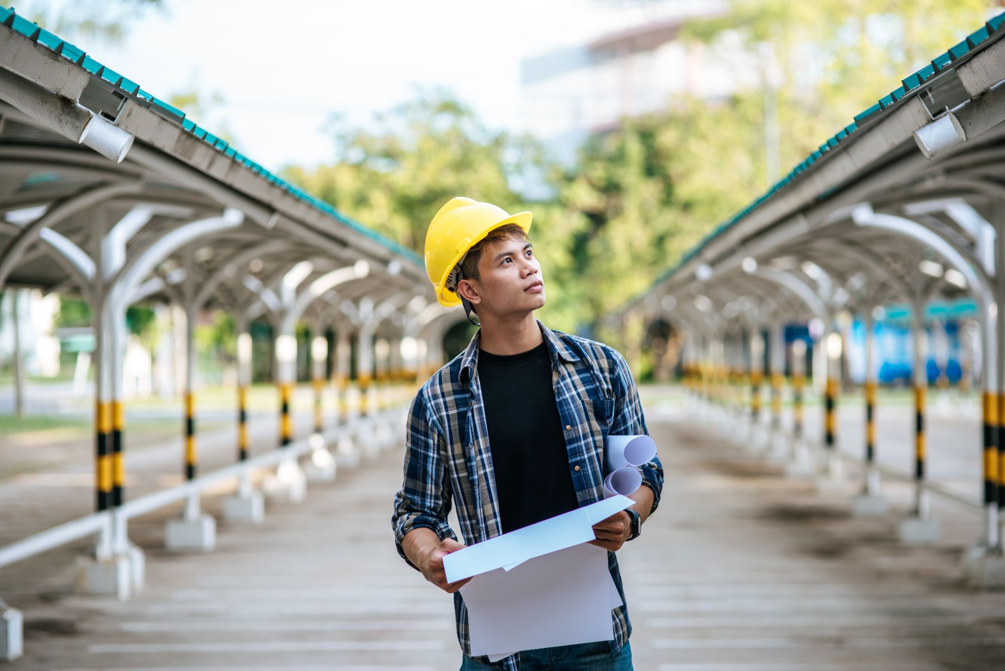 Engineering student looking at building