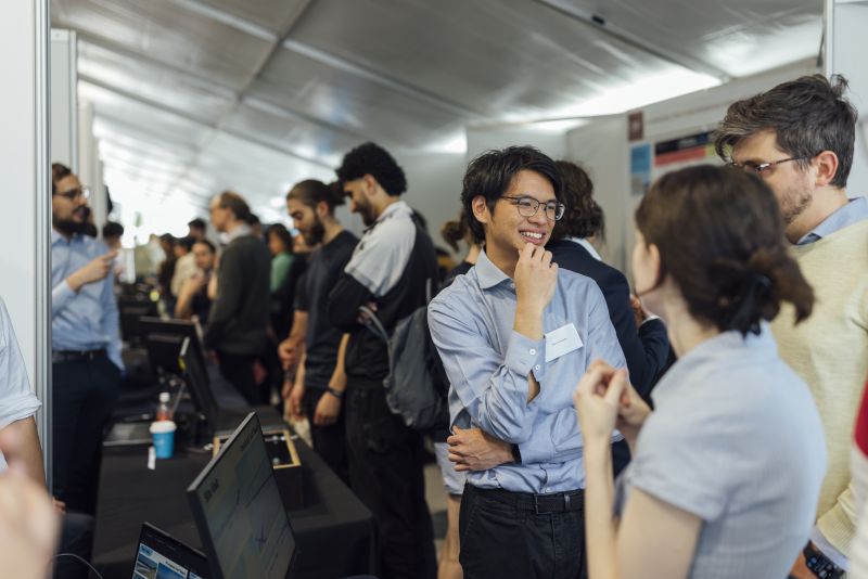 People laughing at expo.