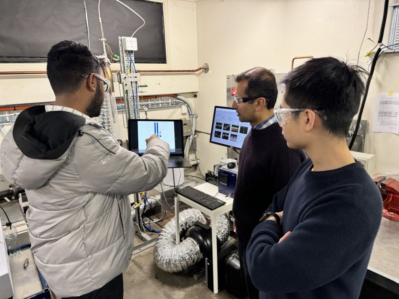 Three researchers in a lab.