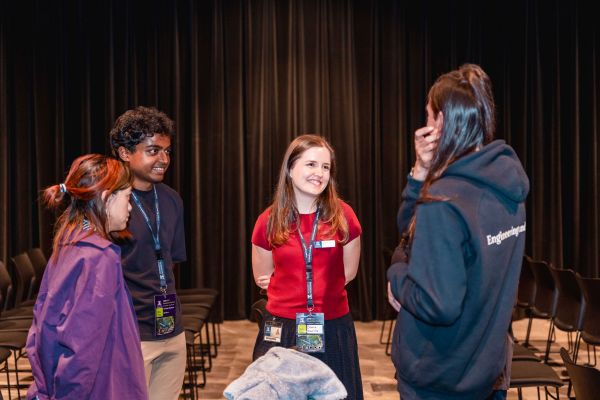 Hackathon staff talking
