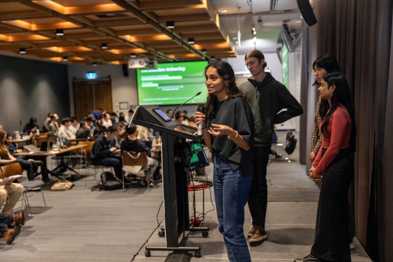Telstra scholarhip recipient Risa Pais pitches her teams project idea at the 203 Telstra FEIT Hackathon