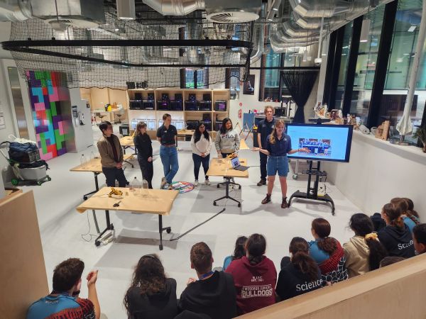 Students attend a presentation in the Telstra Creator Space for RISE 2023