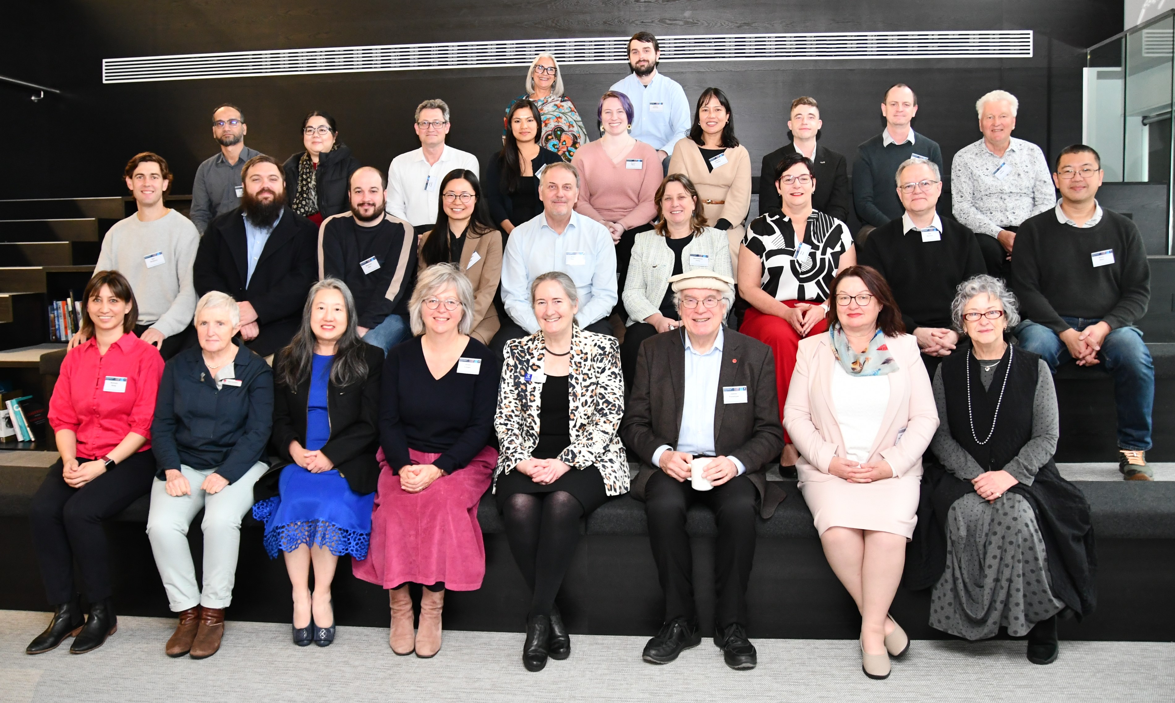 Summit delegates and attendees gather for a photograph
