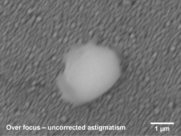 Astigmatism in over-focussed SEM