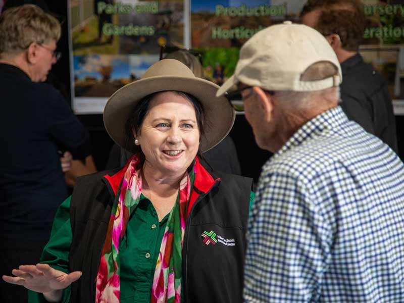 Centre CEO Rebecca Wells talking to dried grape industry innovator Ivan Shaw at the field days.