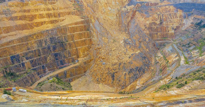 Open mine with section collapsed due to landslide
