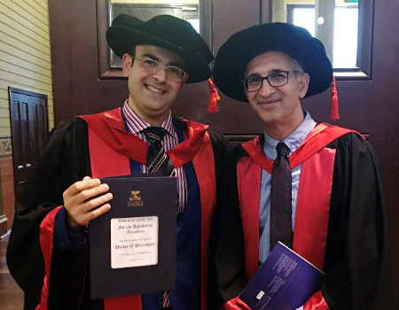Farzad Alamdara with his doctoral degree