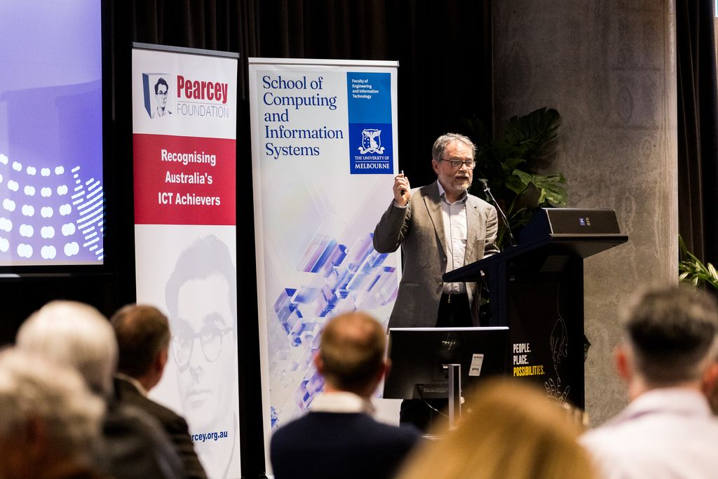 Professor Justin Zoble addresses the audience