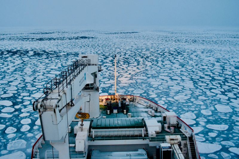 Icebreaker vessel on icy waters.