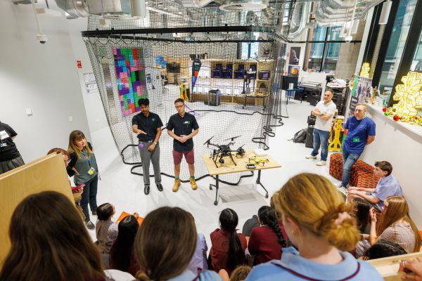 Students watching the Telstra drone presentation at Tech Taster 2024.