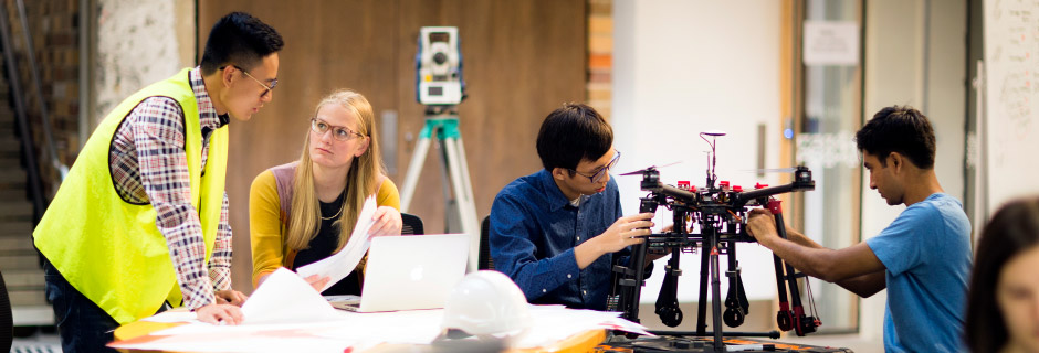 Four students working on a variety of projects